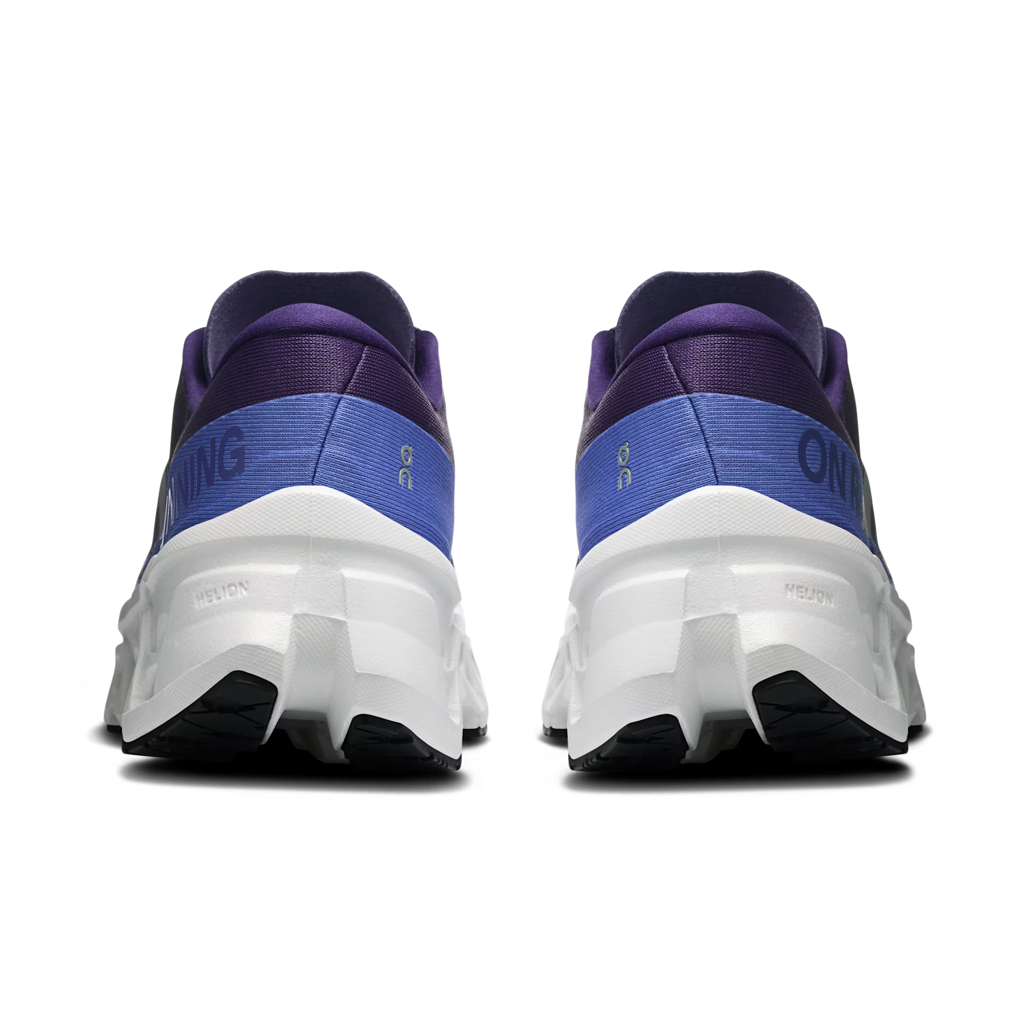 Pair of blue and purple running shoes with white soles on a transparent background