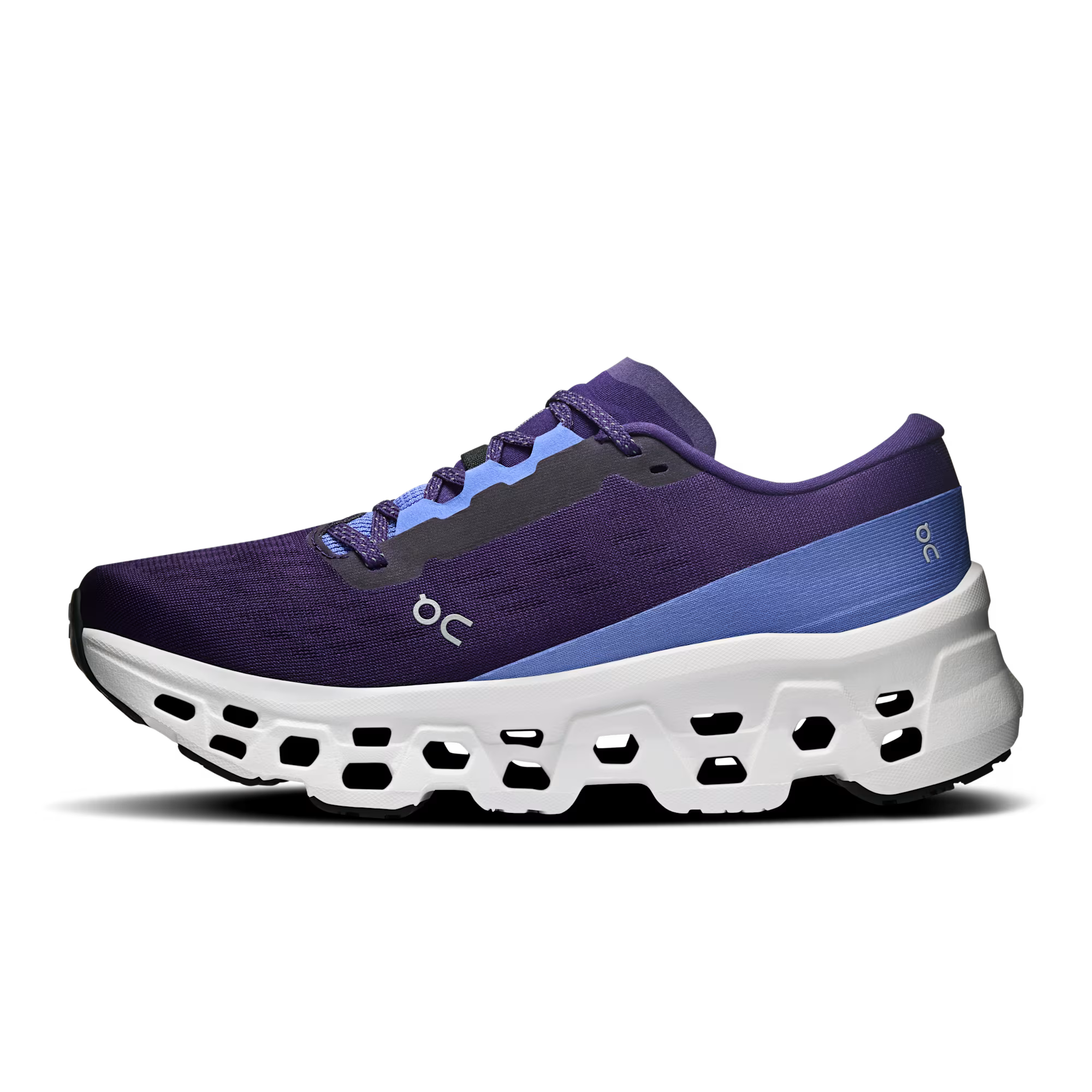 Purple and blue running shoe with white sole on a white background