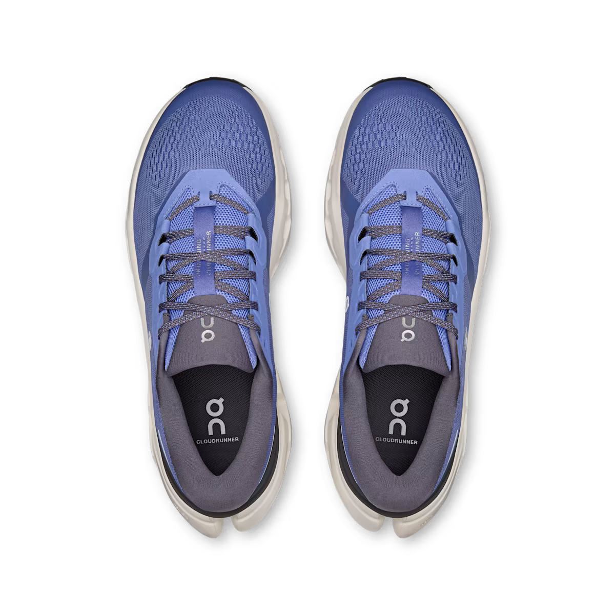 Blue running shoes with gray accents on a white background