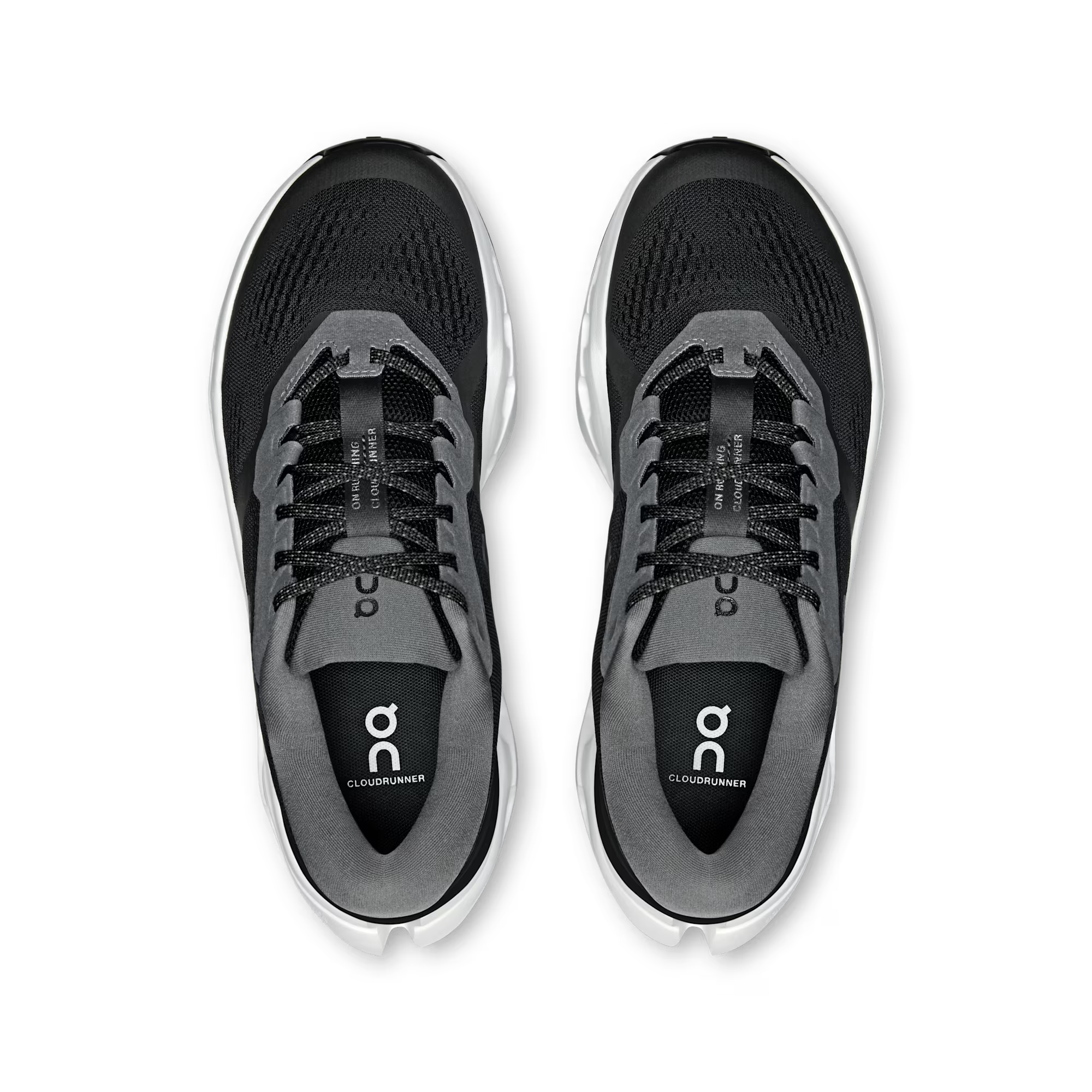 A pair of black and gray running shoes shown from a top-down view on a clean white background. The shoes feature a black mesh upper, gray synthetic overlays, black laces, and a white midsole.