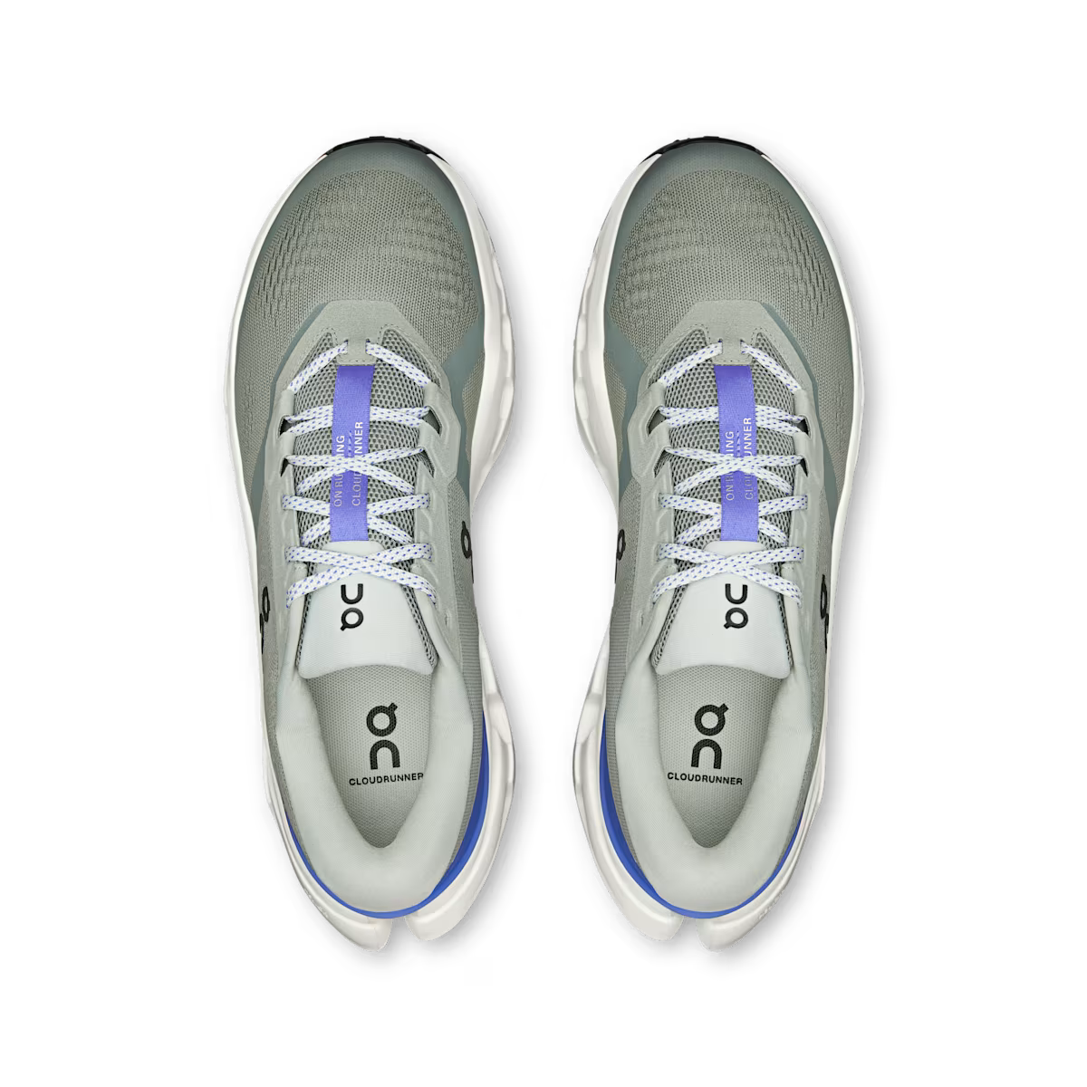 Pair of gray running shoes with white soles on a transparent background