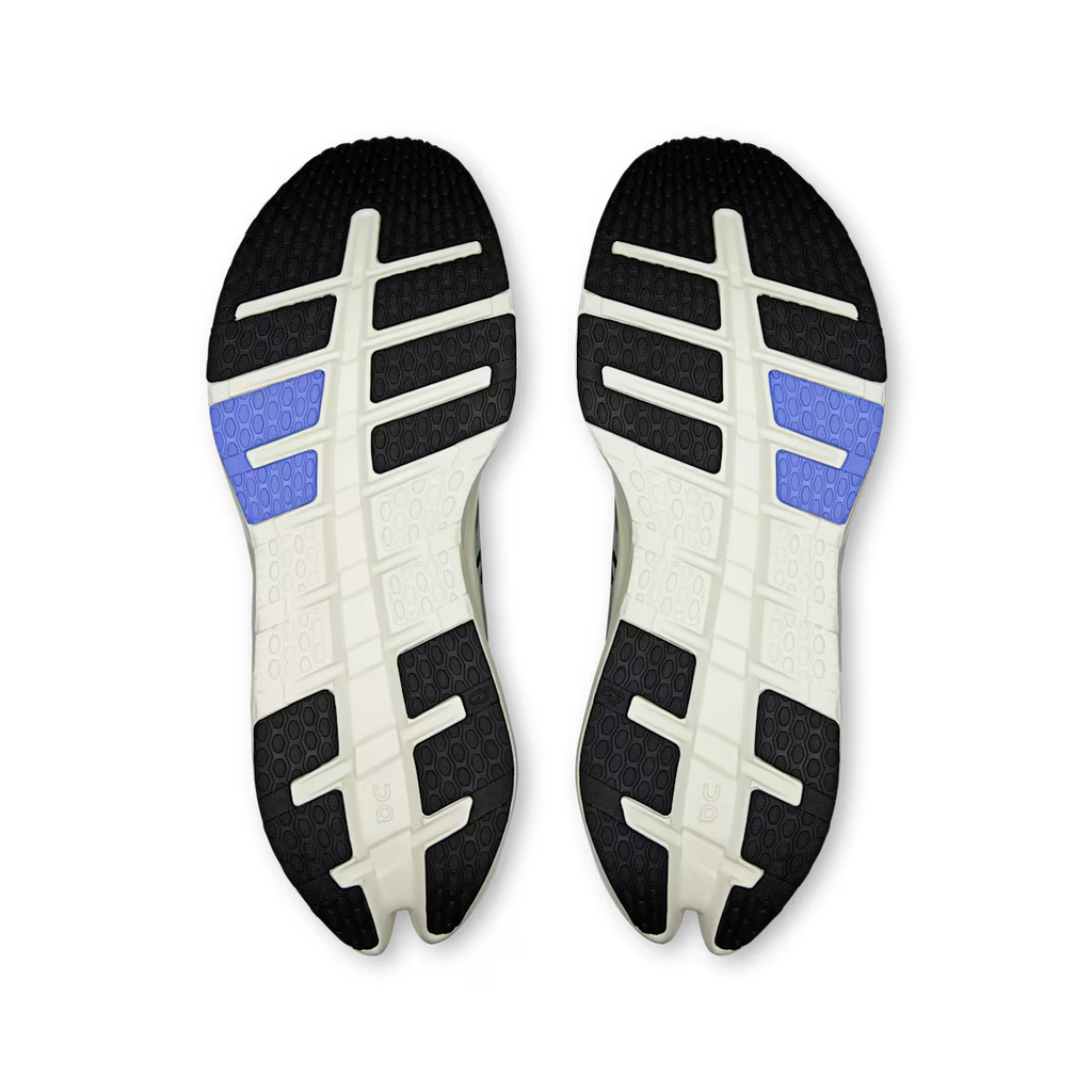 Black, white, and blue sole of a shoe on a transparent background