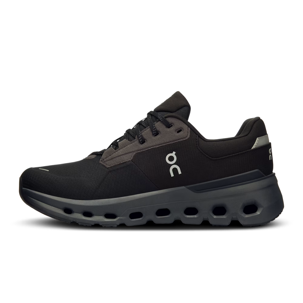 Black running shoe with a visible brand logo on a white background