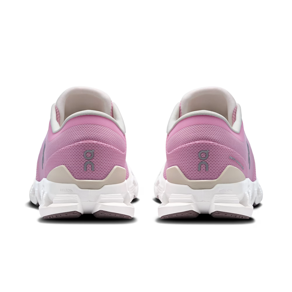 Pink running shoes with white soles on a transparent background
