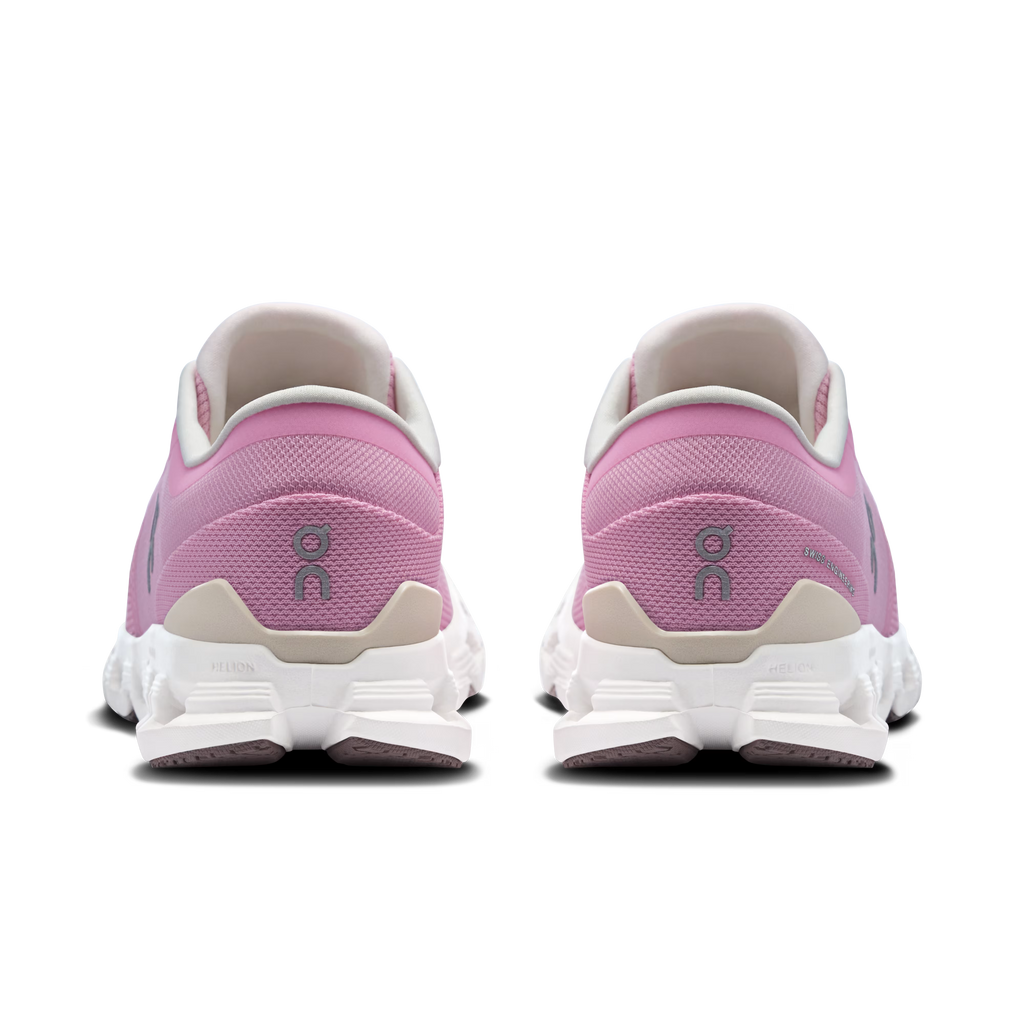 Pink running shoes with white soles on a transparent background