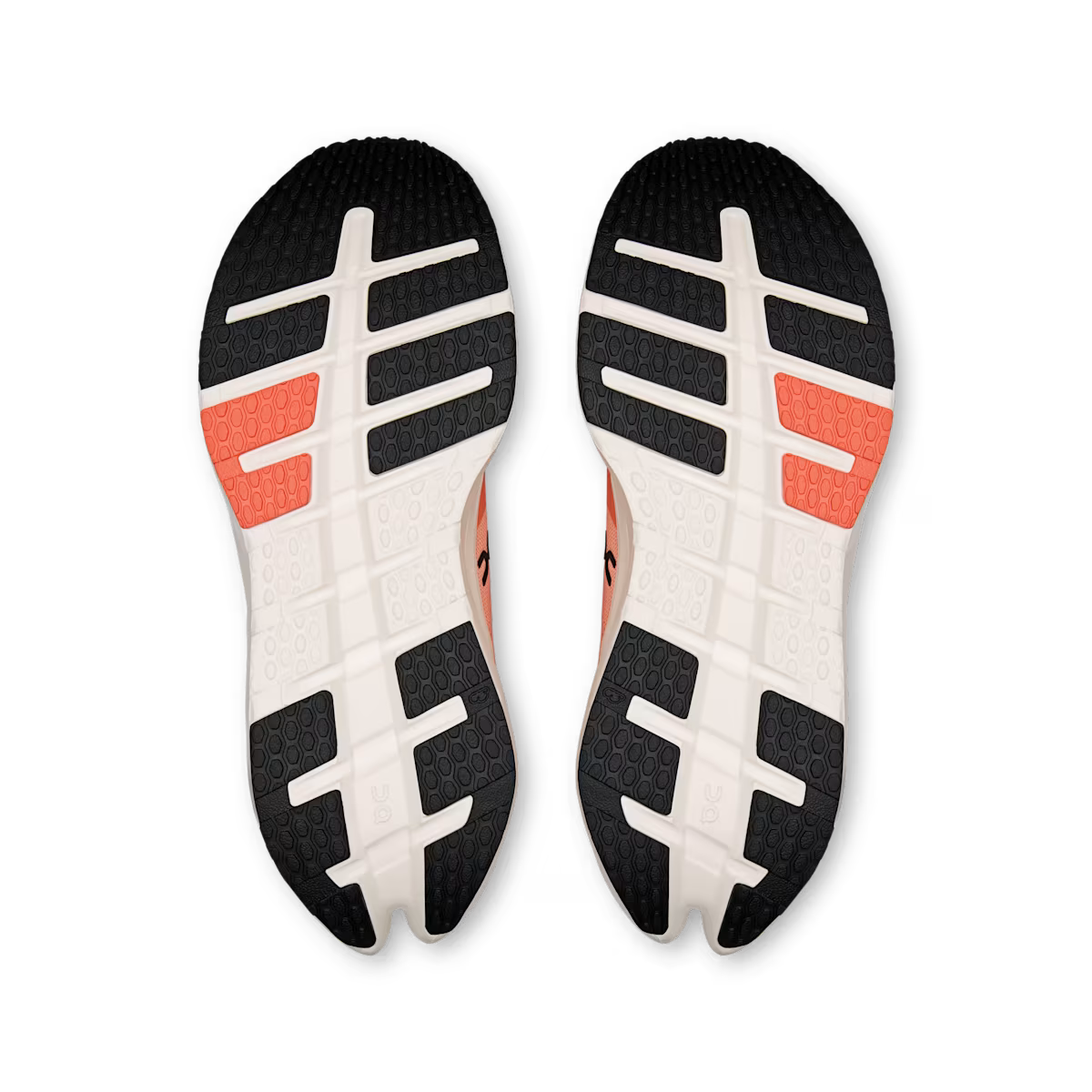 Black, white, and orange sole of a shoe on a transparent background