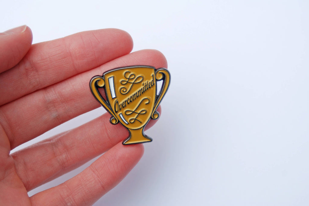 Overcommitted Trophy Enamel Pin