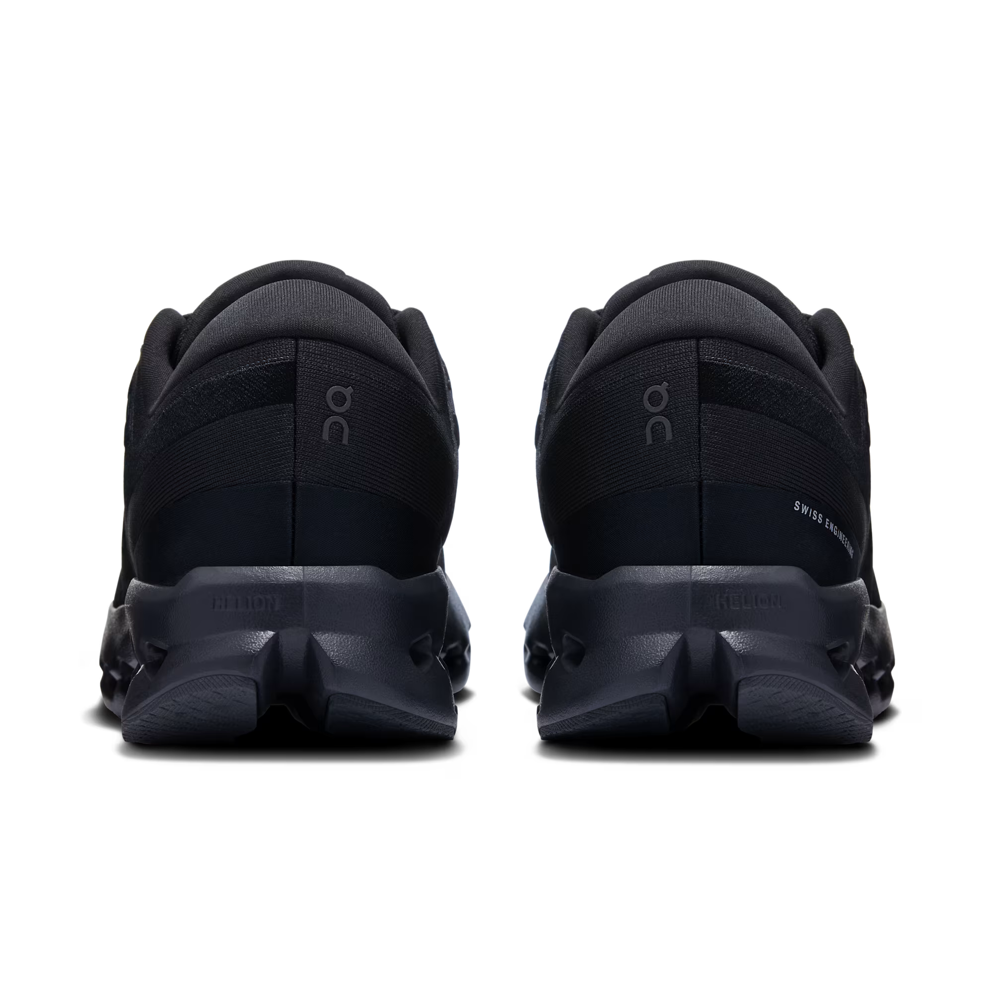 Black athletic shoes shown from the back on a white background