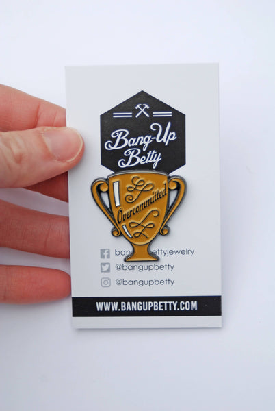 Overcommitted Trophy Enamel Pin