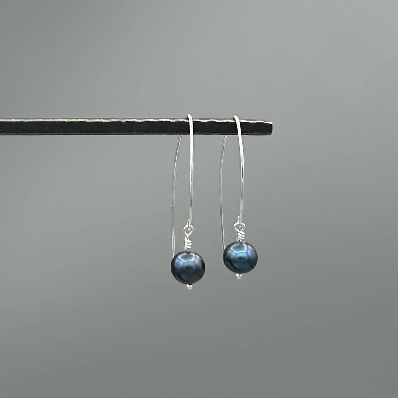 Grey Pearl Curved Wire Earrings
