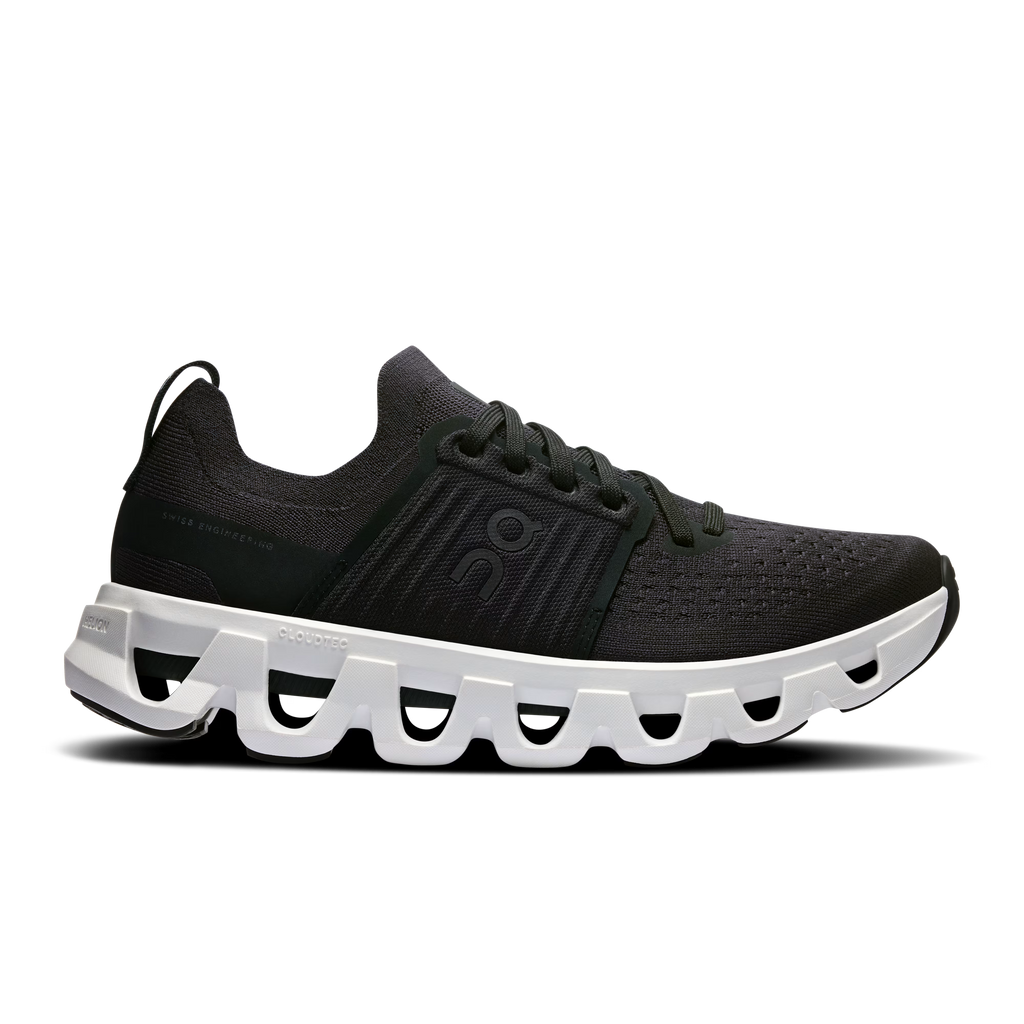 Black running shoe with white sole on a white background