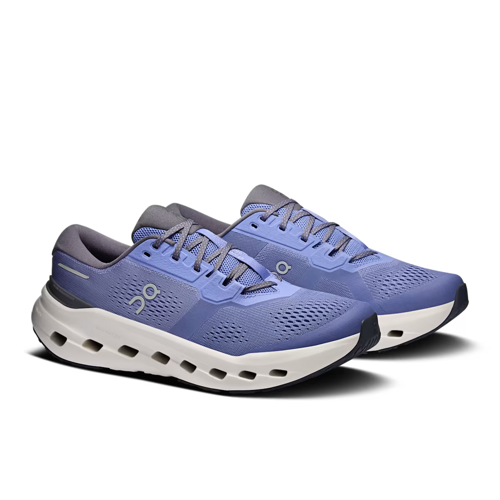 Blue running shoes with white soles on a transparent background
