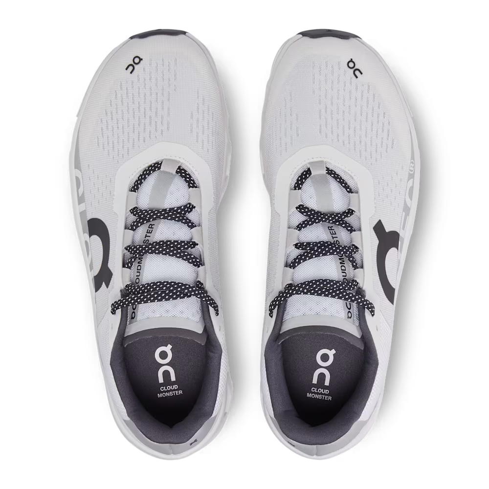 White running shoes with black accents on a transparent background