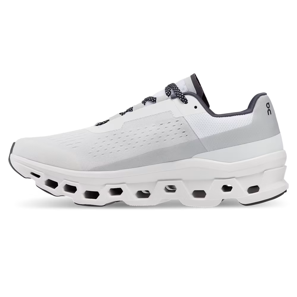 White athletic shoe with gray accents on a white background