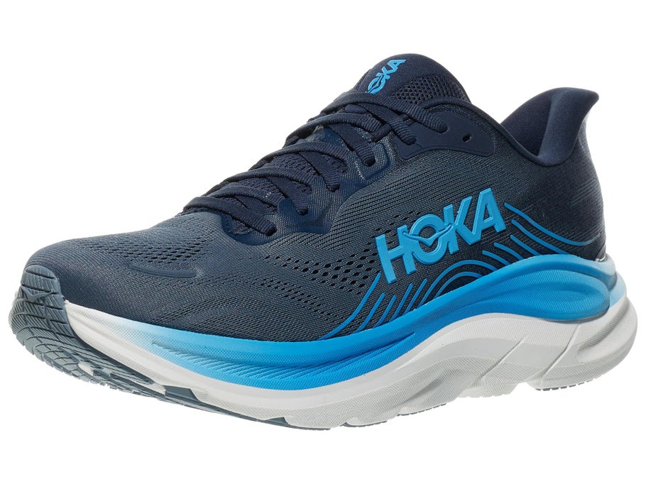 A HOKA running shoe in navy blue and bright blue, shown from a side profile view against a plain white background.